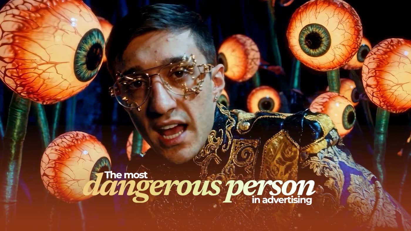 A face surrounded by giant psychedelic eyeballs